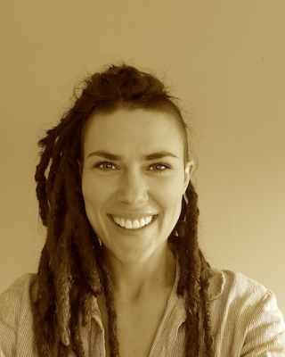 Smiling woman with long brown hair