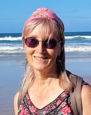 Image of woman by ocean